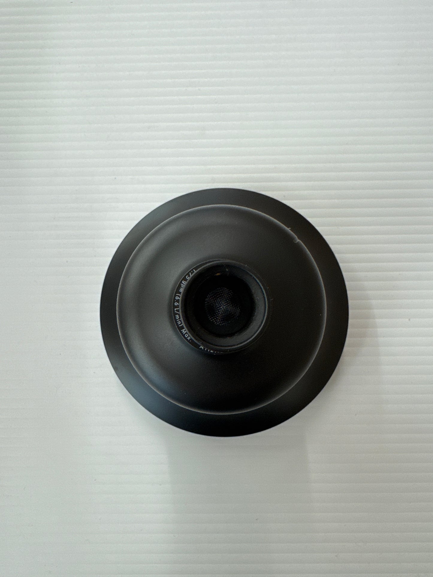 Cinq Round 1-Spray Filtered Showerhead with 1.75 GPM 5.5 in., Wall Mount Fixed in Matte Black