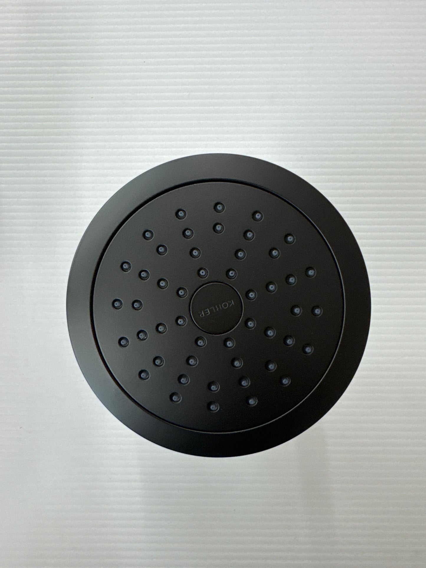 Cinq Round 1-Spray Filtered Showerhead with 1.75 GPM 5.5 in., Wall Mount Fixed in Matte Black